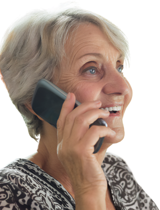 Elderly woman, smiling, holding a cell phone to her ear